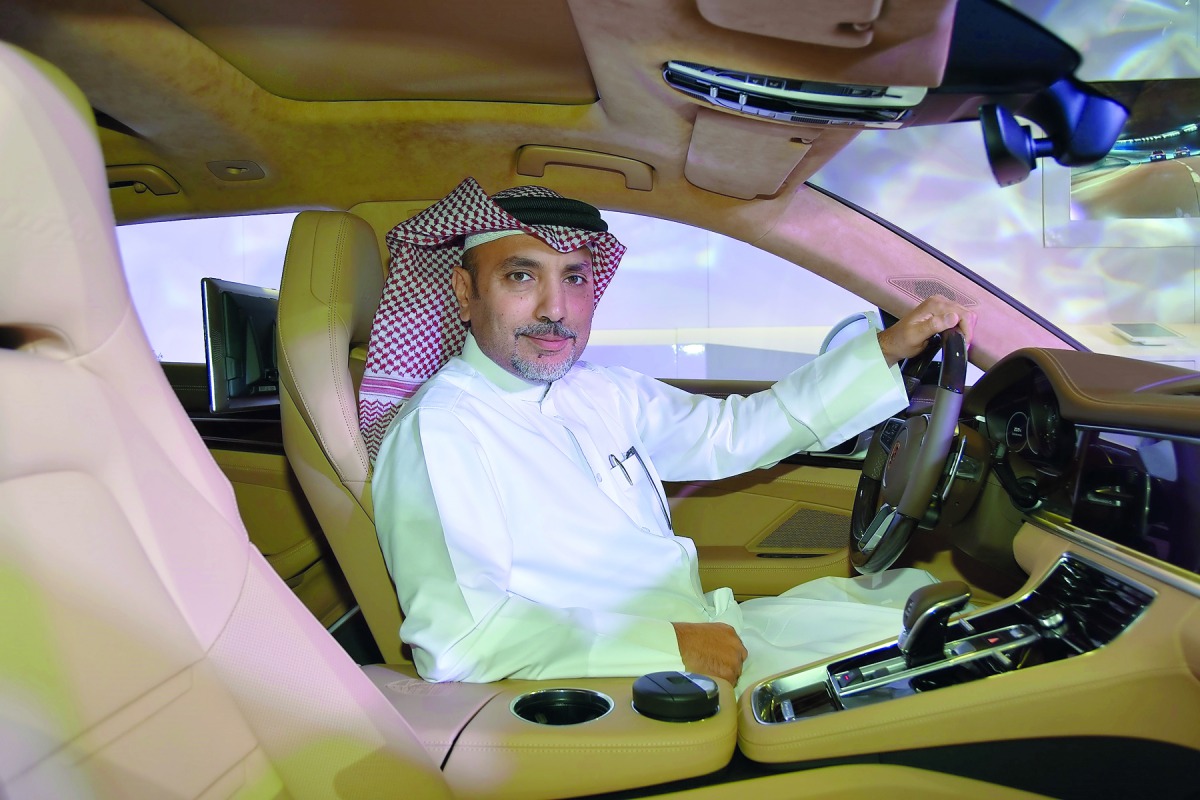 Salman Jassem Al Darwish, Chairman and CEO of Porsche Centre Doha, inside the all-new Porsche Panamera Turbo Sport Turismo.