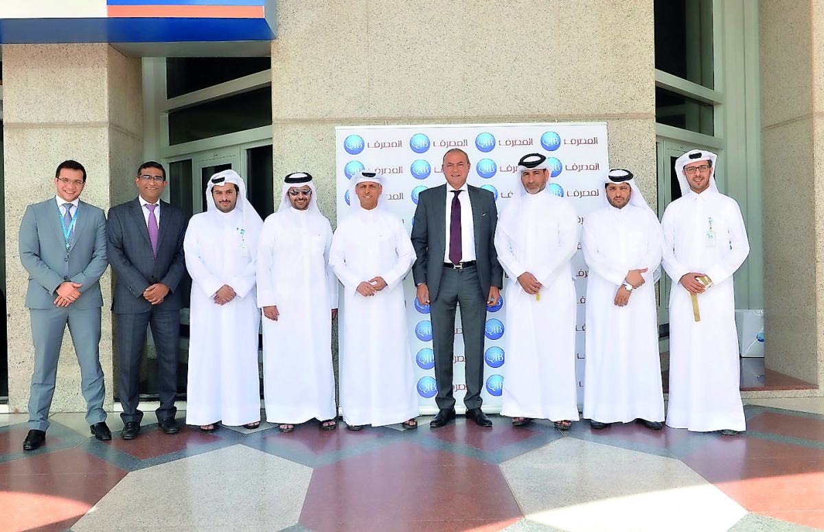 QIB Executive Management and Staff at the blood donation drive event.