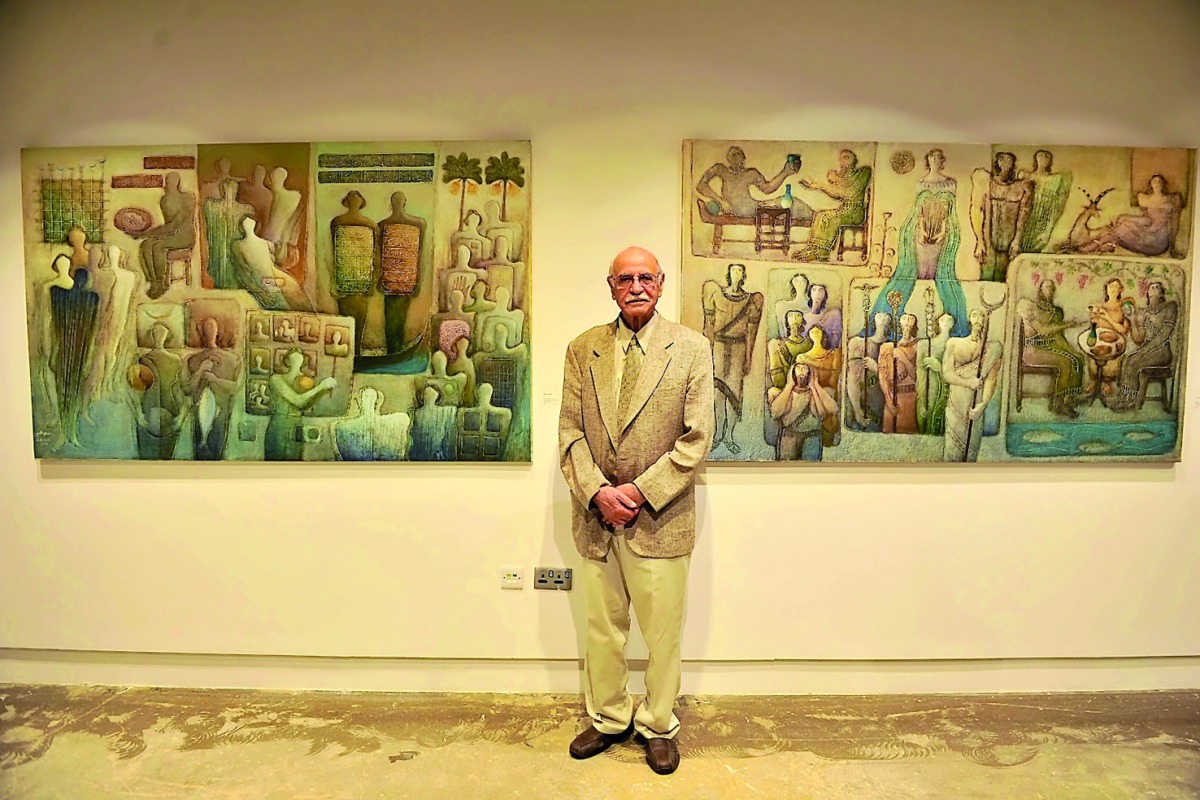 Renowned Iraqi artist Saadi Al Kaabi with some of his works at the opening of “Discourse of Silence” exhibition at Al Markhiya Gallery, at Fire Station, yesterday. Pic: Baher Amin / The Peninsula