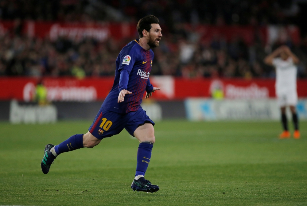 Barcelona's Lionel Messi celebrates scoring their second goal REUTERS/Jon Nazca
