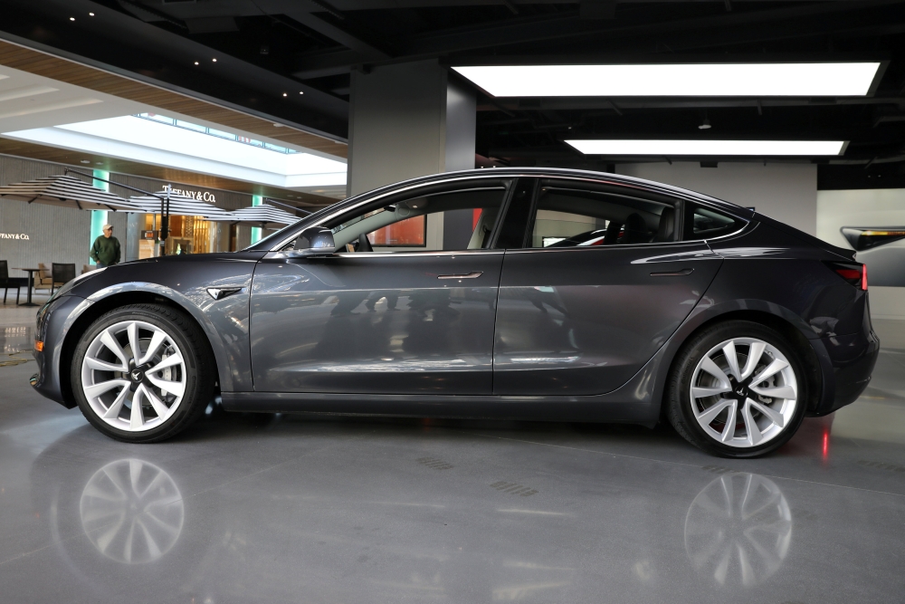  A Tesla Model 3 is seen in a showroom in Los Angeles, California, U.S. January 12, 2018. Reuters/Lucy Nicholson