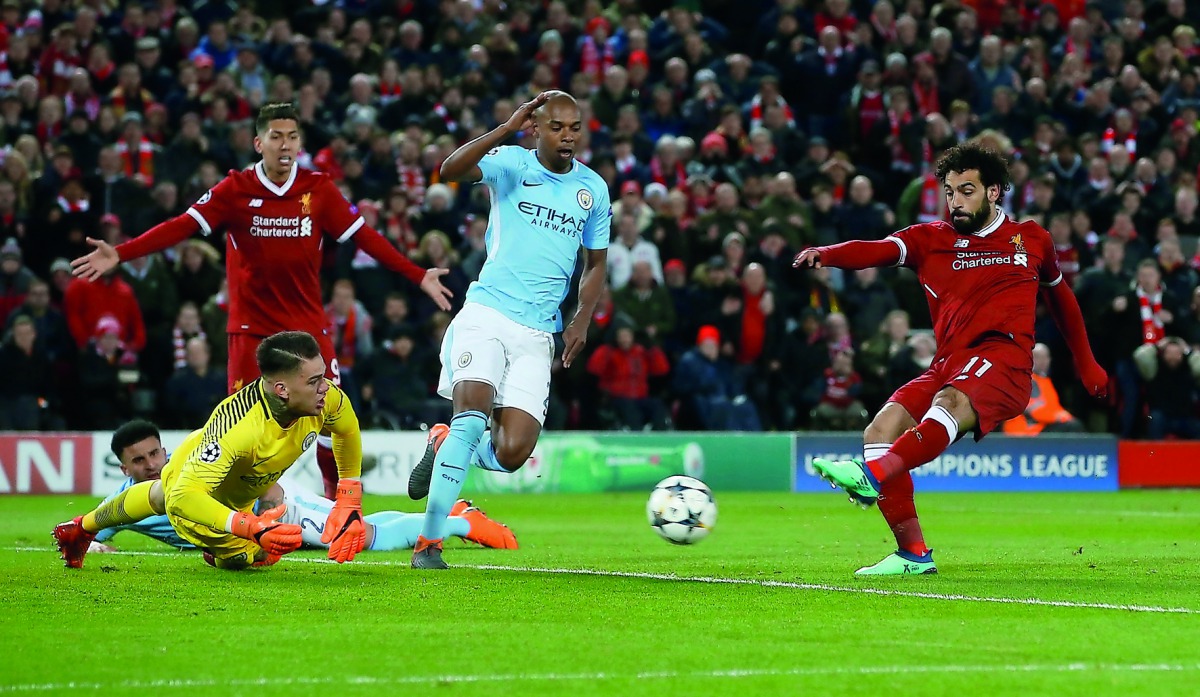 Liverpool's Sadio Mane scores their third goal. Reuters/Andrew Yates