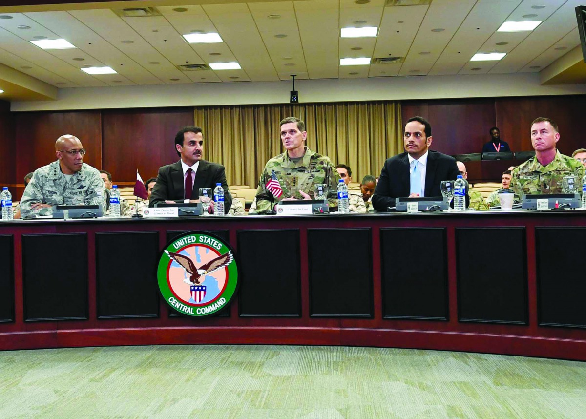 Emir H H Sheikh Tamim bin Hamad Al Thani, Deputy Prime Minister and Foreign Minister H E Sheikh Mohammed bin Abdurahman Al Thani, Commander of United States Central Command Joseph Votel, and other officers during a meeting at MacDill Air Force Base in the