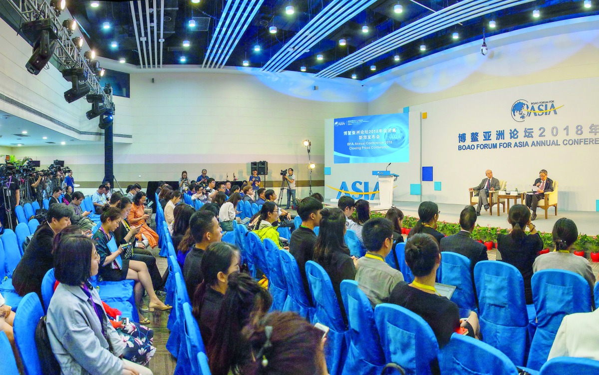 Secretary General of Boao Forum for Asia (BFA) Zhou Wenzhong (R), speaks during the closing press conference of the BFA Annual Conference 2018 in Boao, south China's Hainan province, on April 11, 2018. The BFA annual conference 2018 took place between Apr