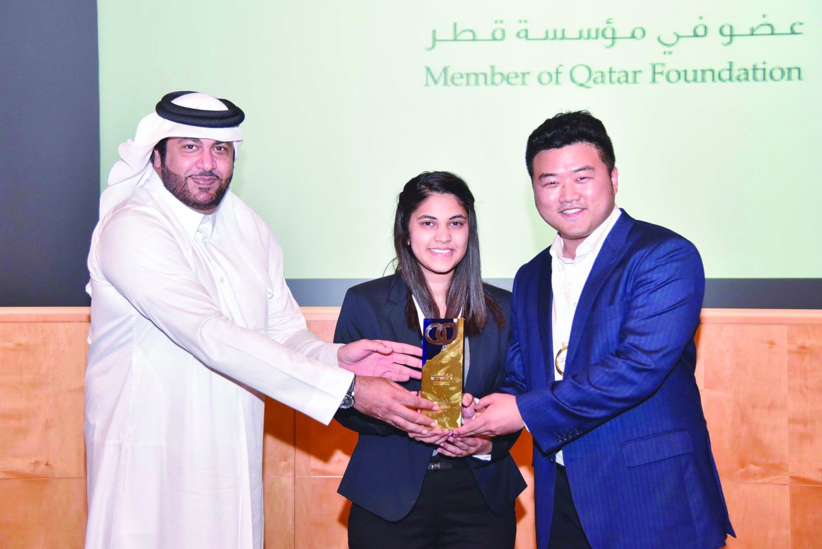Georgetown University in Qatar’s (GU-Q), Yoonsuk Choi and Fatima Farooqui receiving the title.