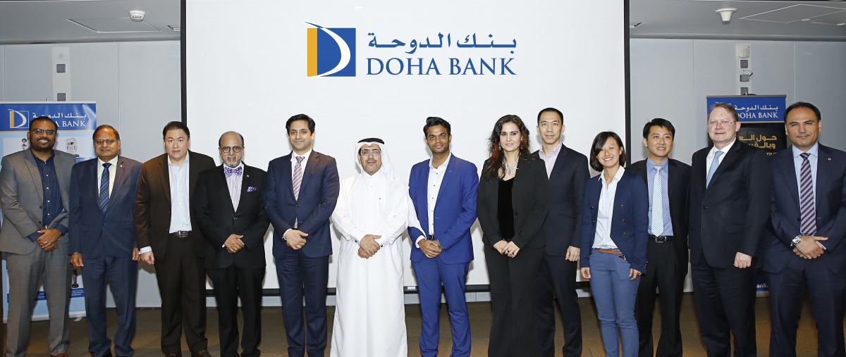 Dr R Seetharaman (fourth left), Doha Bank CEO and other bank officials with the visiting Singapore business delegation, at Doha Bank headquarters yesterday.
