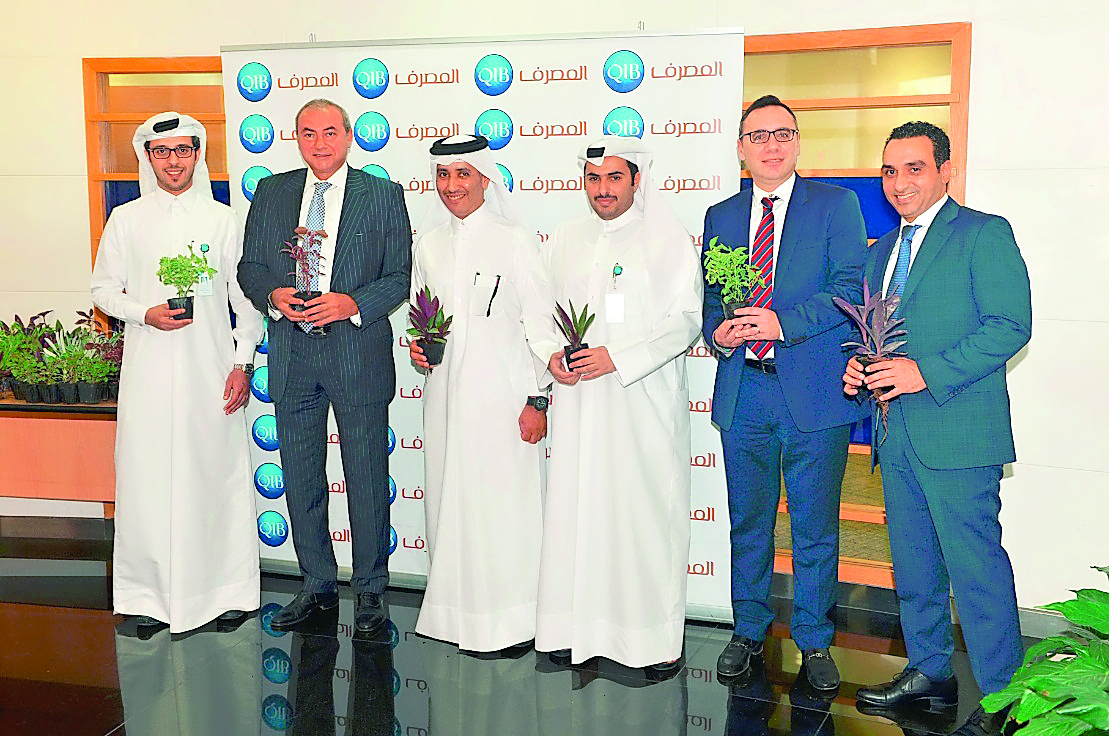 Bassel Gamal (second left), QIB Group CEO, along with Senior Executive Management members of QIB.