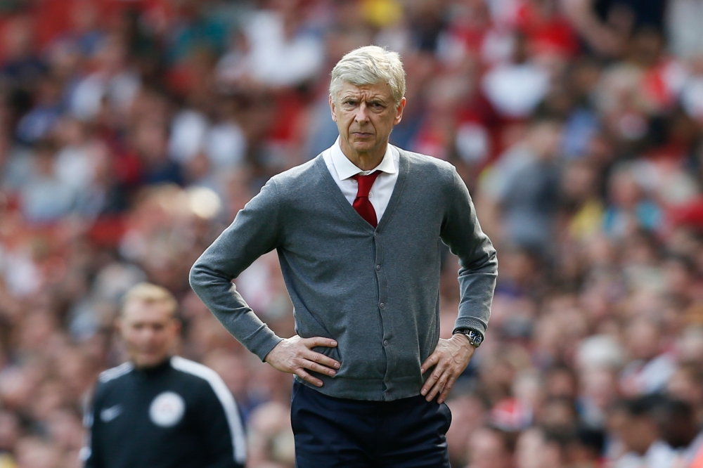 Arsenal's French manager Arsene Wenger watches on from the touch line during the English Premier League football match between Arsenal and West Ham United at the Emirates Stadium in London on April 22, 2018.  /AFP/Ian KINGTON 