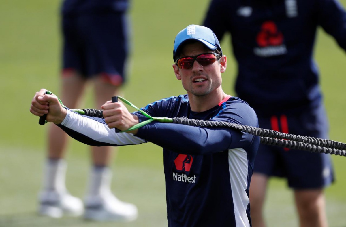 FILE PHOTO: England's Alastair Cook warms up before nets. REUTERS/Paul Childs
