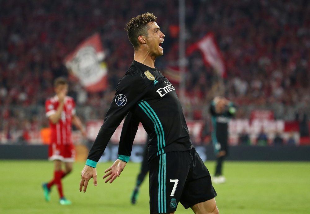 Real Madrid's Cristiano Ronaldo reacts after his goal is disallowed for handball REUTERS/Michael Dalder

