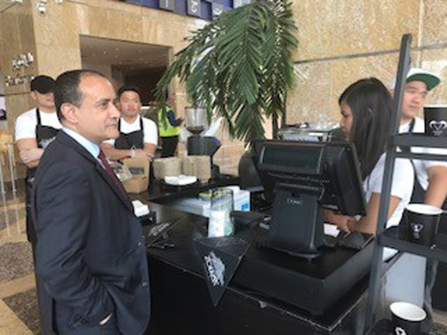 Commercial Bank Group CEO Joseph Abraham visiting one of the counters.