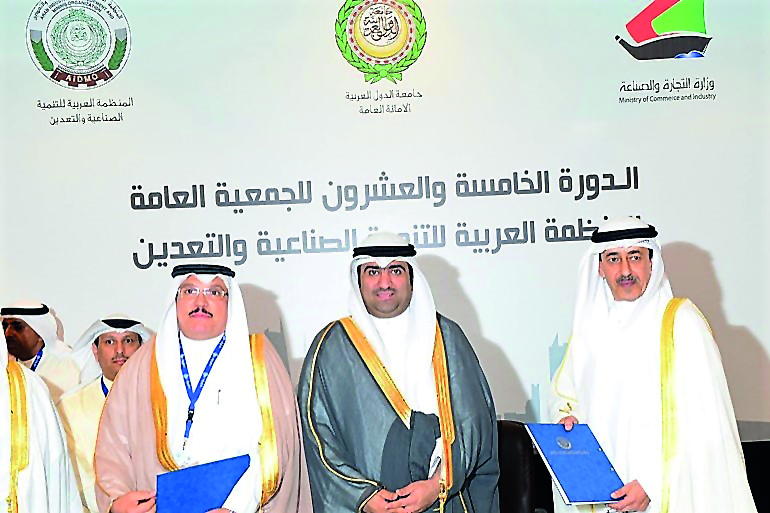 Abdulaziz bin Hamad Al Ageel (left), Secretary-General of GOIC; and Adel Sakr Abdulkareem Al Sakr (right), Director-General of AIDMO, after signing the MoU in Kuwait.