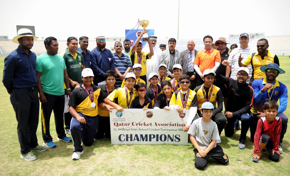 Qatar Cricket Association (QCA) President Yousef Jeham Al Kuwari and other officials with Stallions Cricket Academy players after they won the QCA Under-14 school tournament at the Asian Town Cricket Stadium.