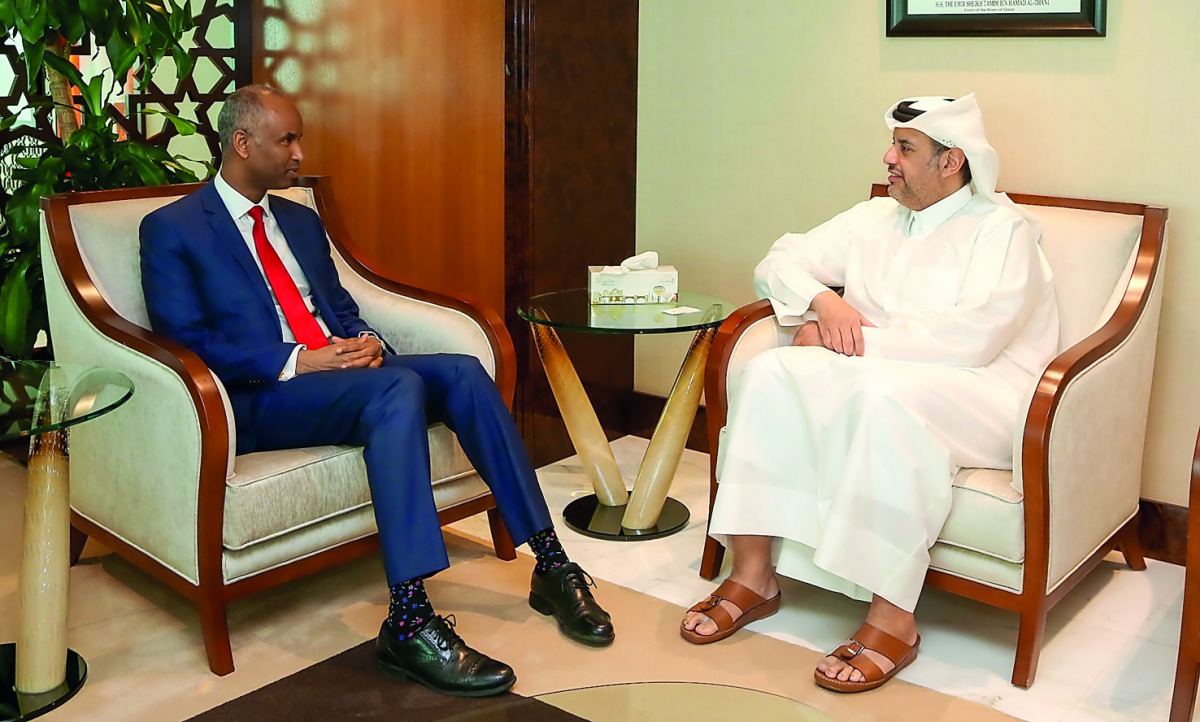 H E Sheikh Ahmed bin Jassem Al Thani, Minister of Economy and Commerce, with the visiting  Minister of Immigration, Refugees and Canadian Citizenship, Ahmed Hussen, and his accompanying delegation at his office in Doha, yesterday.