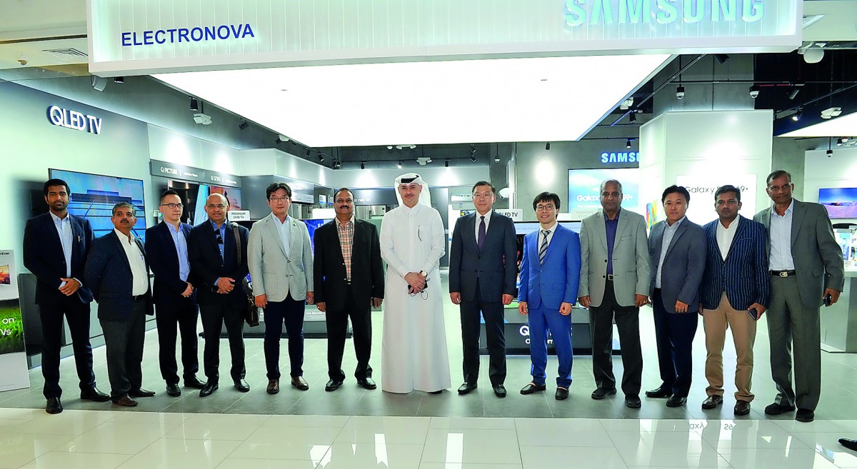 Nabil A R Abu Issa, Chairman of Techno Blue, with C L Lee, President of Samsung Gulf Electronics, GCC;  Andrew Shin, President of Samsung Gulf Electronics, Qatar; and other officials, during the opening of the third Samsung brand shop in Qatar, at Doha Ci