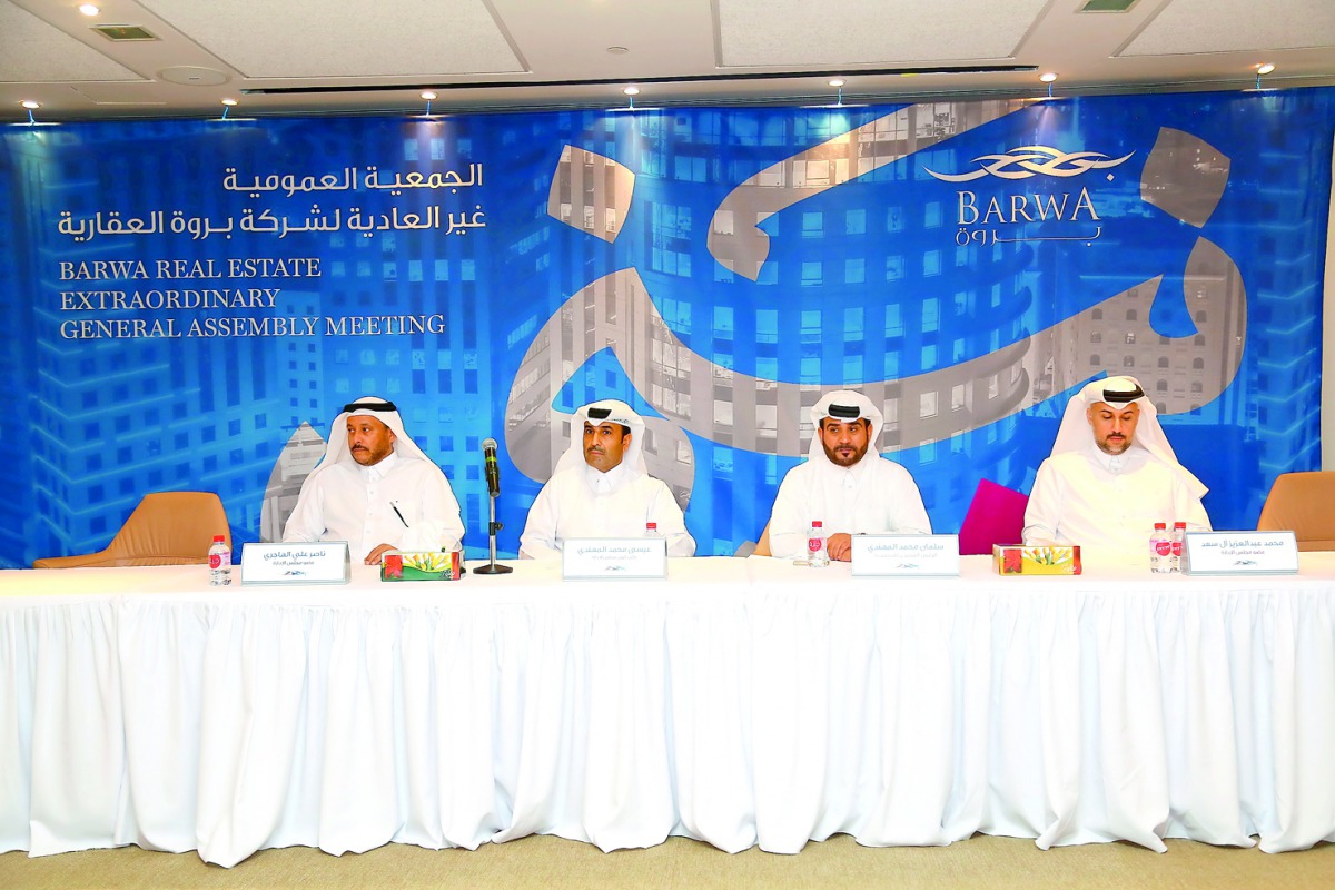 Barwa Real Estate Company officials during the Extraordinary General Assembly meeting.