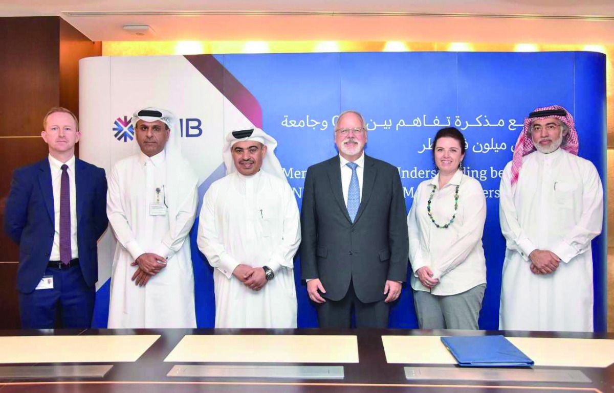 Ali Al Kuwari (third left), QNB Group CEO; Michael Trick (third right), Dean of CMU-Q, and other senior officials after signing the MoU for cooperation between QNB and Carnegie Mellon University in Qatar (CMU-Q).