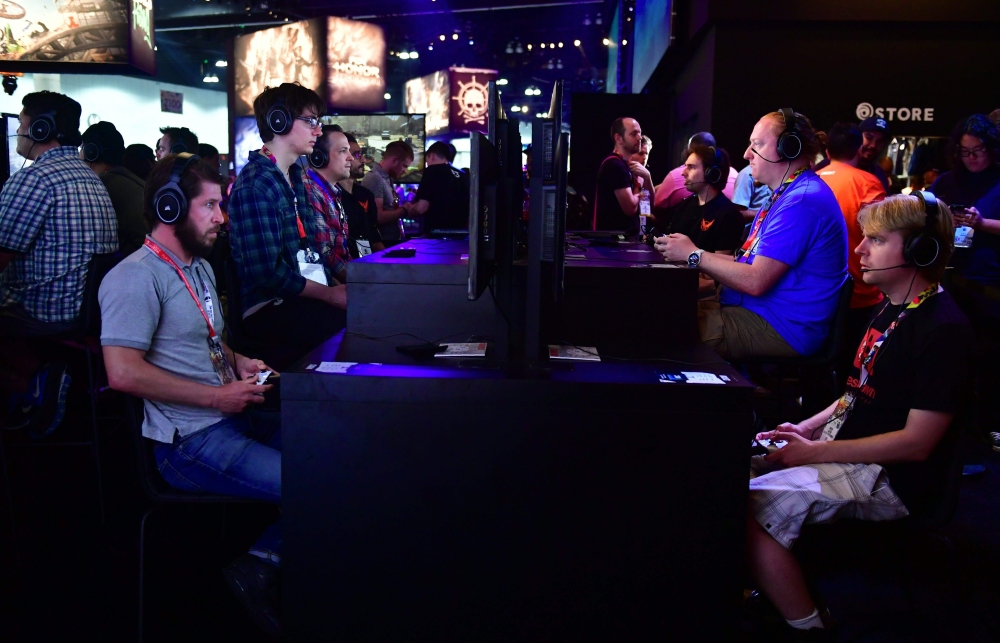 Gaming fans play at the 24th Electronic Expo, or E3 2018. Image used for representation purposes only. / AFP / Frederic J. BROWN 