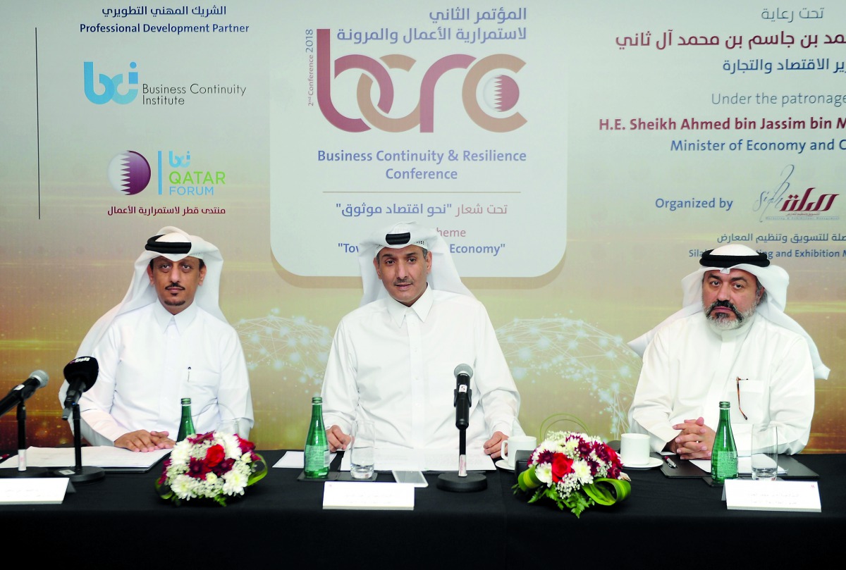 Saud Omar Al Mana (centre), representing the Qatari Businessmen Association;  Abdullatif Ali Al Yafei (left) Chairman of Qatar Business Continuity Forum and Conference President; and Salah Mohammad Al Jaidah, member of the Business Committee during a pres