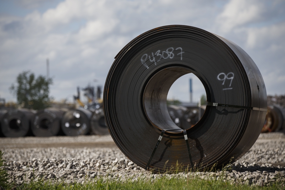 In this file photo taken on June 4, 2018, steel coils lay in a yard at ArcelorMittal Dofasco steel plant in Hamilton, Canada. AFP / Getty Images North America / Cole Burston
 
