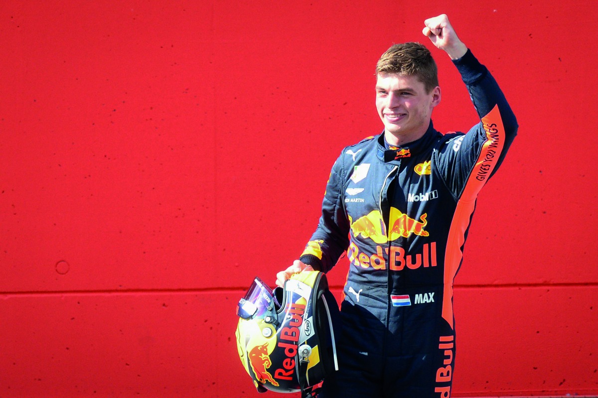 Red Bull's Dutch driver Max Verstappen celebrates winning the Austrian Formula One Grand Prix in Spielberg, central Austria, on July 1, 2018. AFP / Vladimir Simicek
