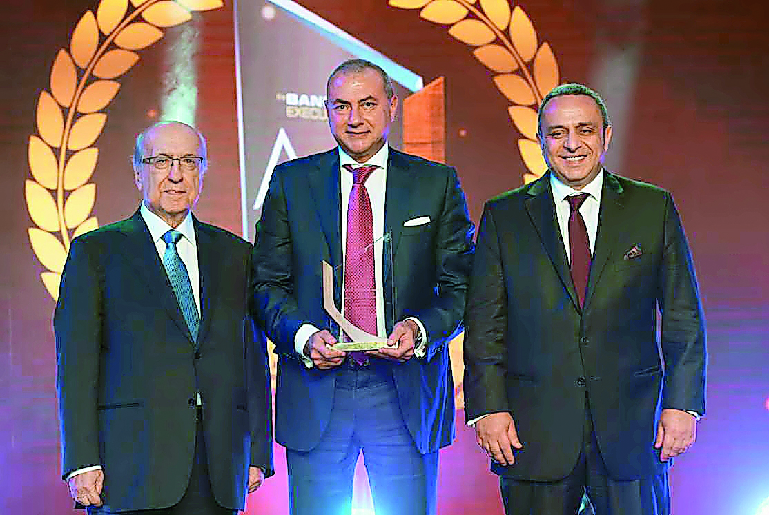 QIB Group CEO Bassel Gamal (centre) with WUAB officials duirng the awards ceremony in Beirut.