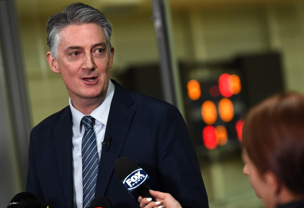 Basketball Australia Chief Executive Officer Anthony Moore speaks during a press conference in Melbourne on July 19, 2018, after the FIBA Disciplinary Panel handed down suspensions and fines following a brawl in Australia's World Cup qualifying game again