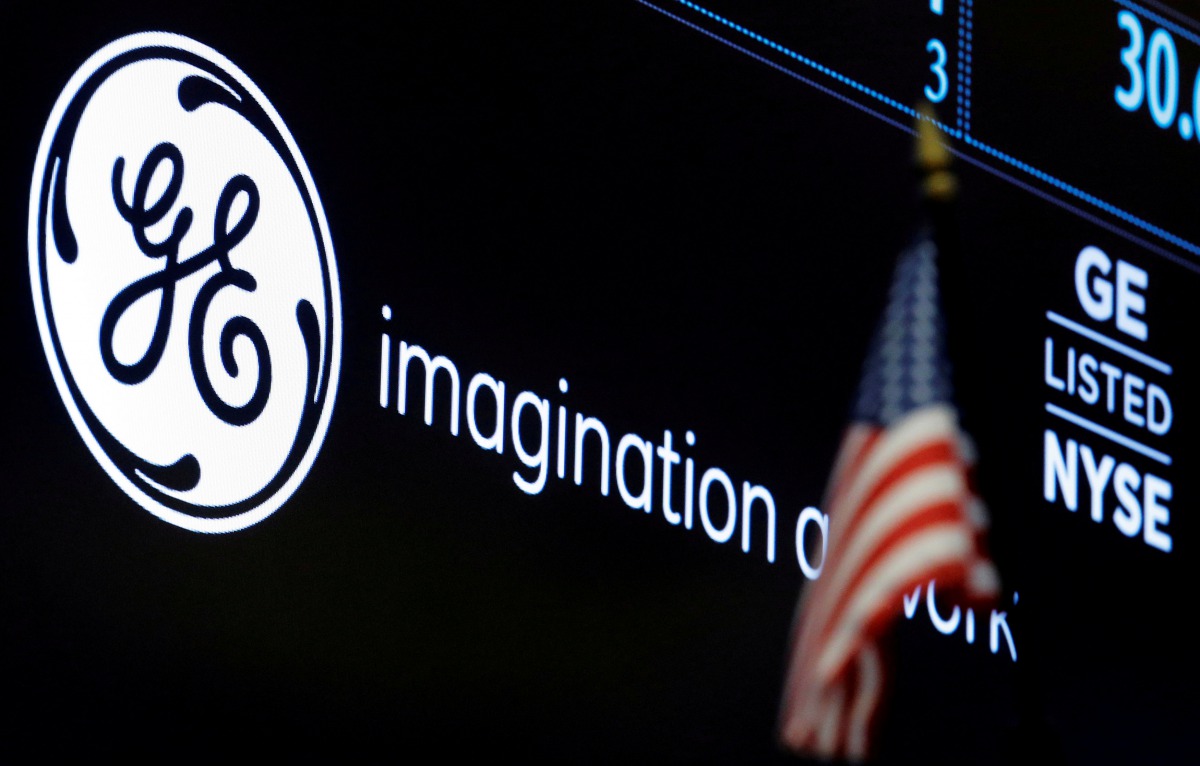 The ticker and logo for General Electric Co is displayed on a screen at the post where it is traded on the NYSE floor on June 30, 2016. (Reuters / Brendan McDermid) 