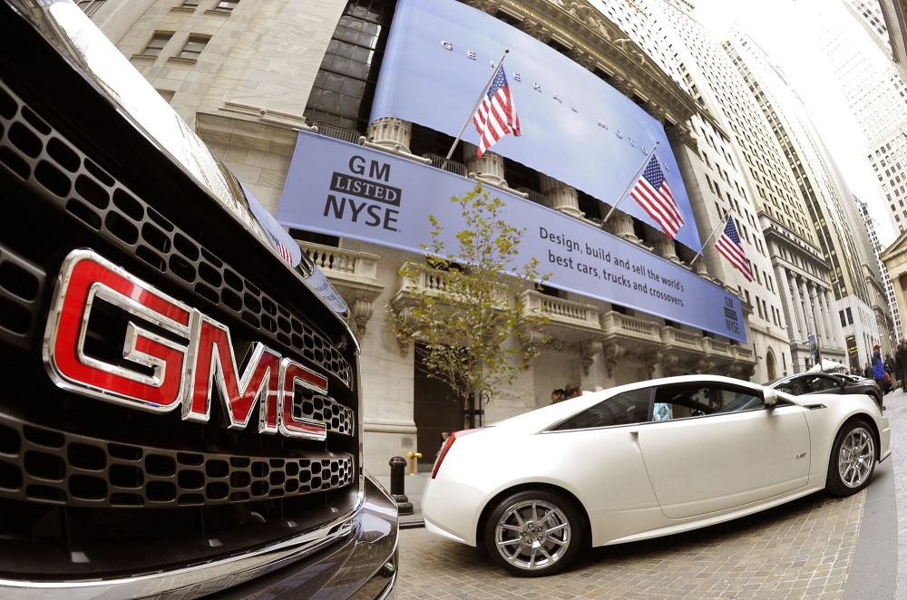 File photo shows GM cars outside the New York Stock Exchange in New York. (AFP / Timothy A. CLARY)