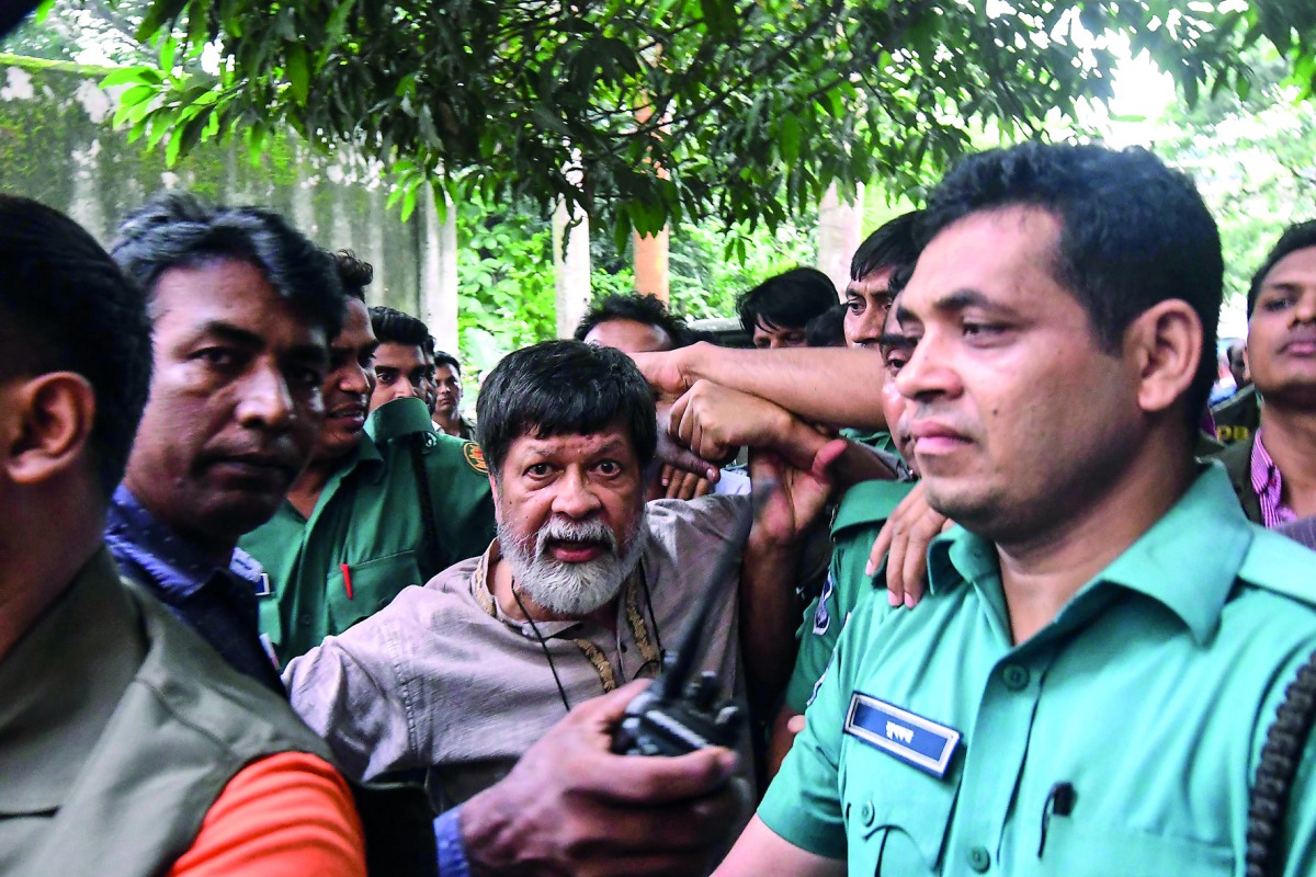 At least 20 plain-clothes officers picked up Shahidul Alam, 63, at his Dhaka home late on Sunday, hours after his critical comments were broadcast on Al Jazeera (Munir Uz Zaman/AFP) 