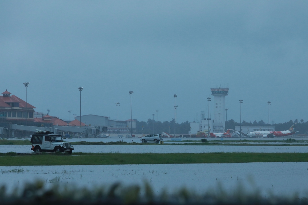 Kochi's International airport apron is seen flooded following monsoon rains in the Indian state of Kerala on August 15, 2018. (AFP)