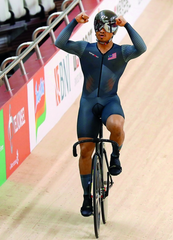 Mohd Azizulhasni Awang of Malaysia reacts. Reuters/Athit Perawongmetha