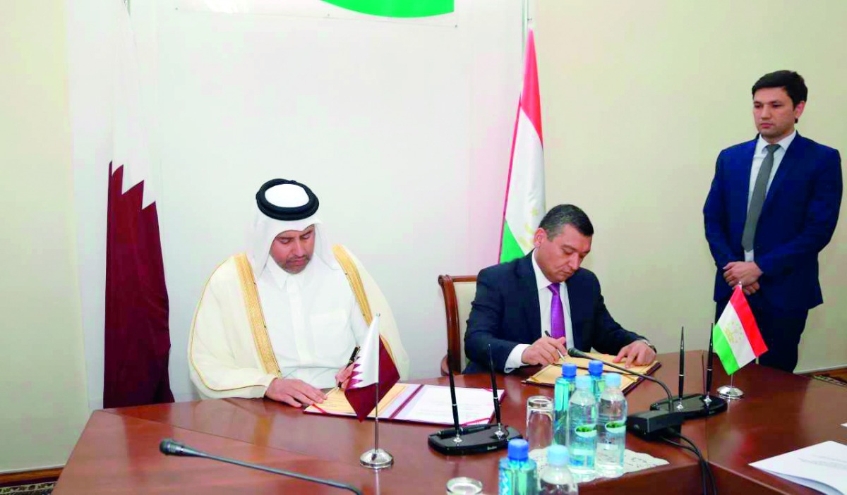 inister of Economy and Commerce H E Sheikh Ahmed bin Jassim Al Thani (left) and  Nematullo Hikmatullozoda, Minister of Economic Development and Trade of Tajikistan, signing a cooperation agreement on the sidelines of the third session of the Joint Economi
