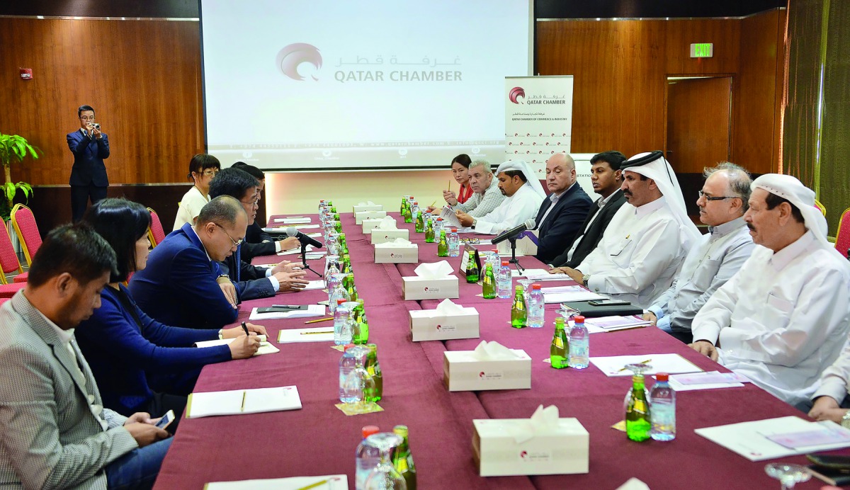 Mohamed bin Ahmed bin Towar Al Kuwari (third left), QC Vice-Chairman, and other Qatari prominent businessmen meeting with the members of Chinese trade delegation at QC headquarters, yesterday. 
