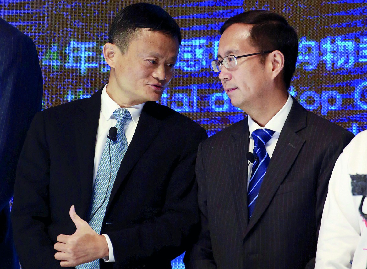 Alibaba Founder and Chairman Jack Ma (L) talks to CEO Daniel Zhang at NYSE Bell Ringing ceremony during Alibaba Group's 11.11 Global shopping festival in Beijing, China, November 11, 2015. Reuters/Kim Kyung-Hoon