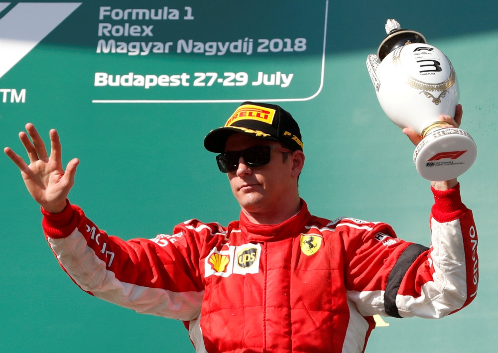 :FILE PHOTO: Ferrari’s Kimi Raikkonen. REUTERS/Bernadett Szabo
