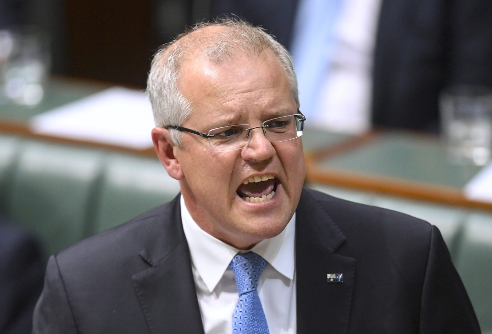 FILE PHOTO - Australian Prime Minister Scott Morrison speaks in the House of Representatives at Parliament House in Canberra, Australia, September 10, 2018. AAP/Lukas Coch/via REUTERS
