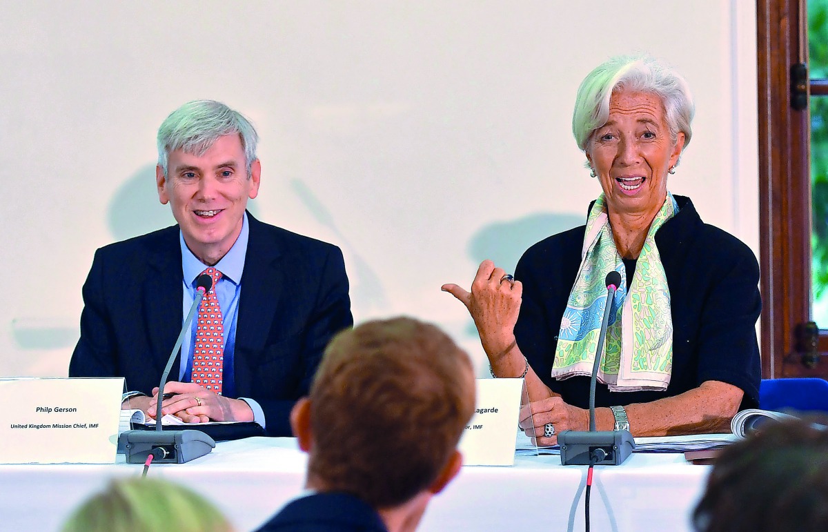 Christine Lagarde, International Monetary Fund (IMF) Managing Director, and IMF Deputy Director Philip Gerson, talk to the media at a news conference to mark the publication of the 2018 Article IV assessment of the UK at the Treasury in London, Britain, S
