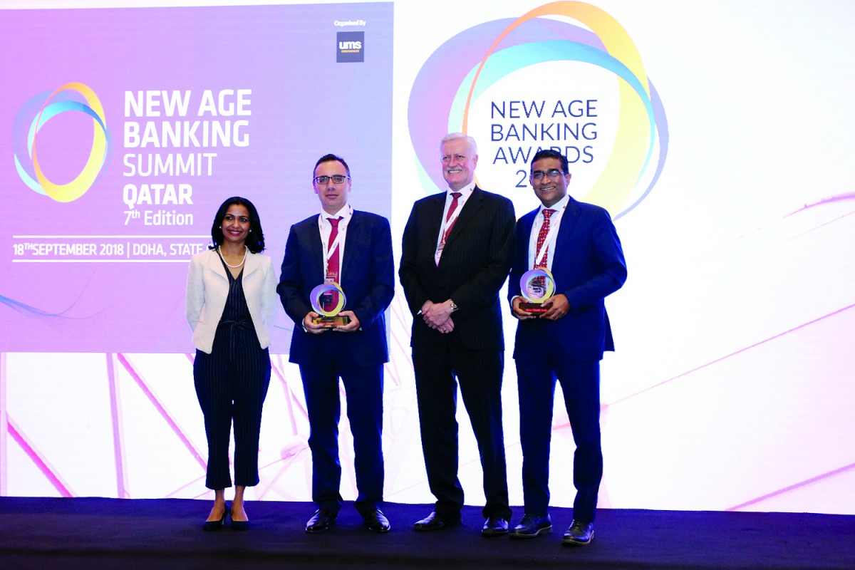 QIB officials with the awards during the New Age Banking Awards 2018 ceremony.