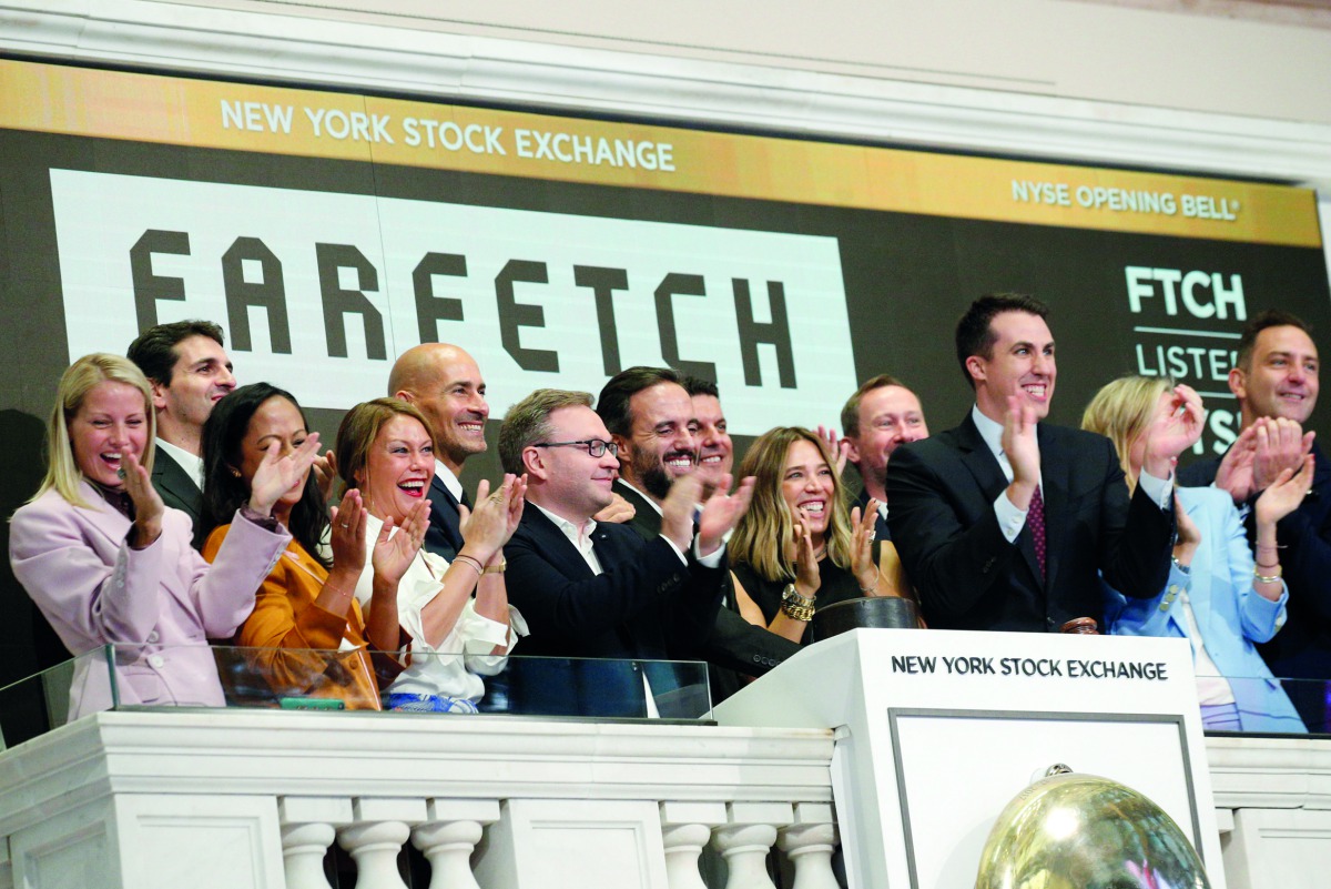 Online fashion house Farfetch's CEO Jose Neves and members of the company's leadership team ring the opening bell to celebrate their IPO at the New York Stock Exchange (NYSE) in New York, U.S., September 21, 2018. Reuters/Brendan McDermid