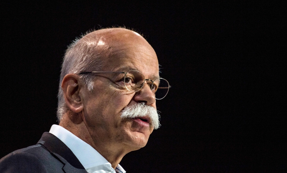 In this file photo taken on April 5, 2018, the CEO of German car manufacturer Daimler Dieter Zetsche addresses shareholders during the company's annual general meeting in Berlin. / AFP / John MACDOUGALL 
