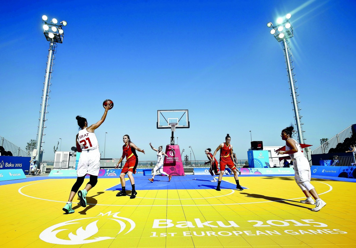 Athletes of Belgium and Turkey play during their women's group stage 3x3 basketball game at the 1st European Games in Baku, Azerbaijan, in this June 23, 2015 file photo. Reuters/Kai Pfaffenbach/Action Images