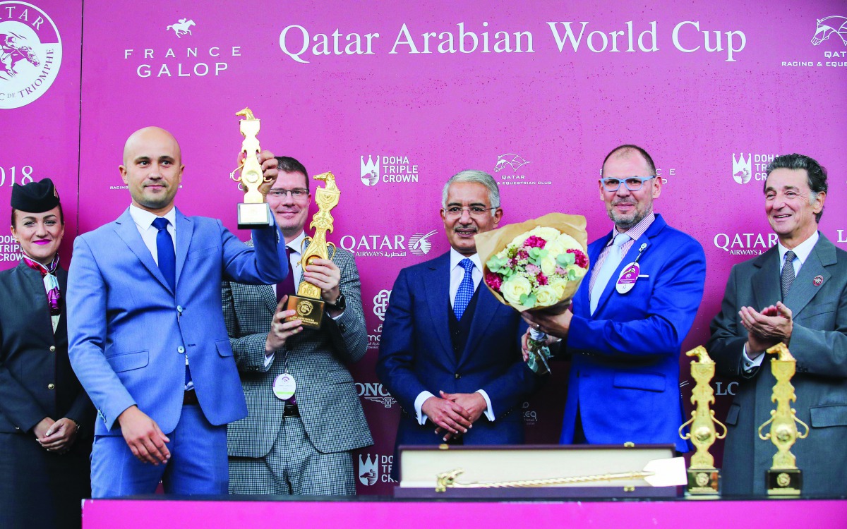 H E Sheikh Abdullah bin Khalifa Al Thani along with other participants at the presentation ceremony for Qatar Arabian World Cup in Paris, yesterday. 