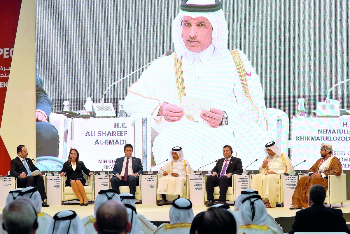 Minister of Finance H E Ali Shareef Al Emadi, (centre) with Minister of Economy and Commerce H E Sheikh Ahmed bin Jassim bin Mohammed Al Thani (second right); Turkey's Deputy Minister of Trade, Gonca Yilmaz Batur (second left);  Tunisia's Minister of Comm