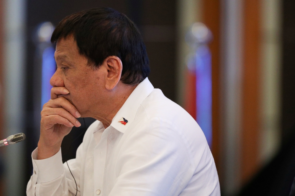 FILE PHOTO: Philippine President Rodrigo Duterte attends the opening session of the 20th ASEAN-JAPAN Summit in Manila, Philippines November 13, 2017. REUTERS/Athit Perawongmetha/File Photo