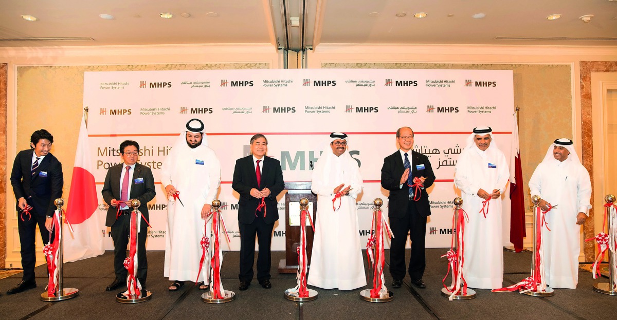 Minister of Energy and Industry H E Dr Mohammed bin Saleh Al Sada and other officials at the opening of Mitsubishi Hitachi Power Systems Ltd’s office in Doha.