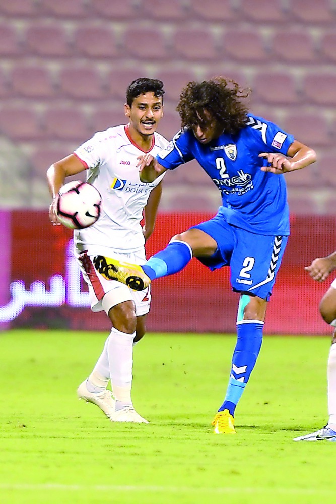Action during QSL Cup match between Al Kharaitiyat and Al Arabi, yesterday. 