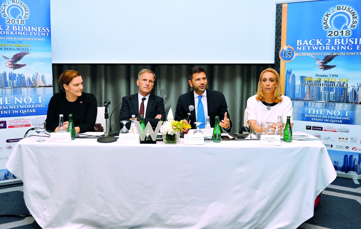 Hans-Udo Muzel (second left), German Ambassador to Qatar; Pasquale Salzano (second right), Italian Ambassador to Qatar; Kathrin Lemke (left), Representative of German Chamber of Commerce (AHK); and Palma Libotte, Chairperson Italian Chamber of Commerce in