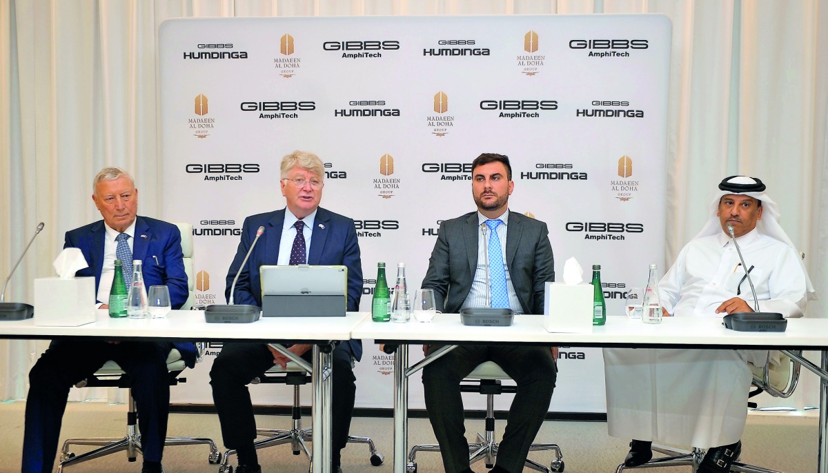 Gibbs Sports Amphibian Chairman Neil Jenkins (second left), Founder and Chief Technology Officer Alan Gibbs (left) and Mohammed Al Sada (right), Partner at Madaeen Al Doha Group, at the event. Pic: Abdul Basit / The Peninsula