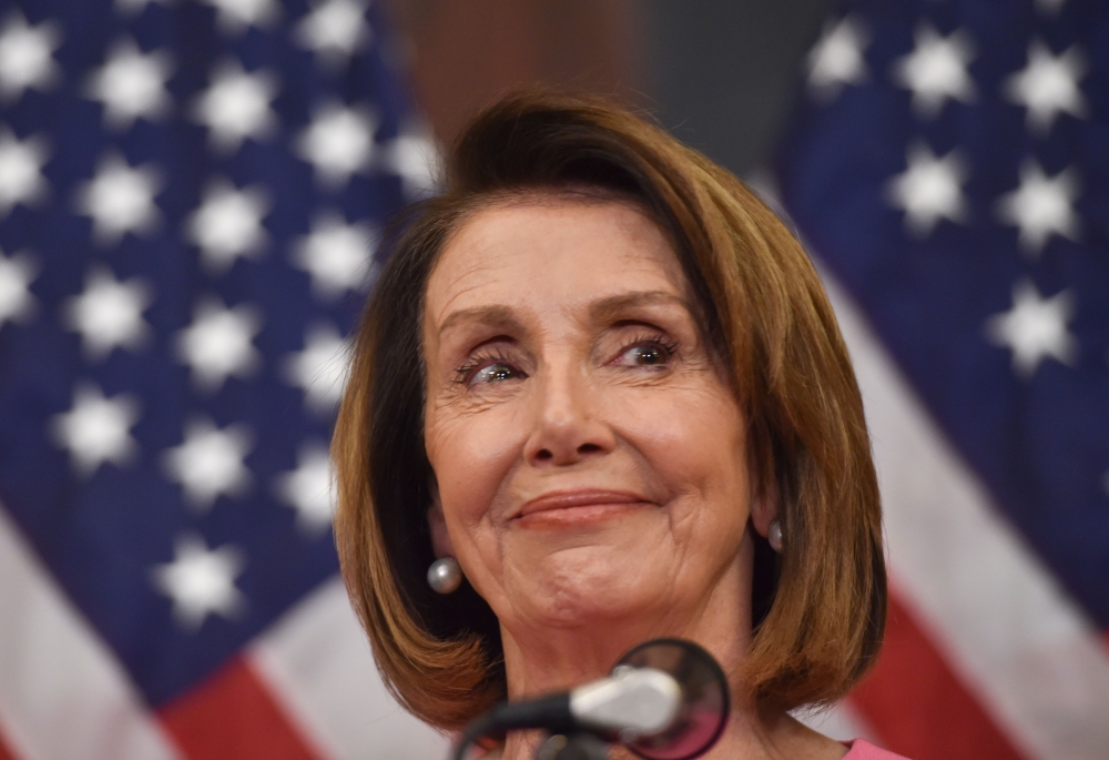 US House Minority leader Nancy Pelosi speaks during a press conference after Democrats took back control of the house in Washington, DC on November 7, 2018.  AFP / Nicholas Kamm   